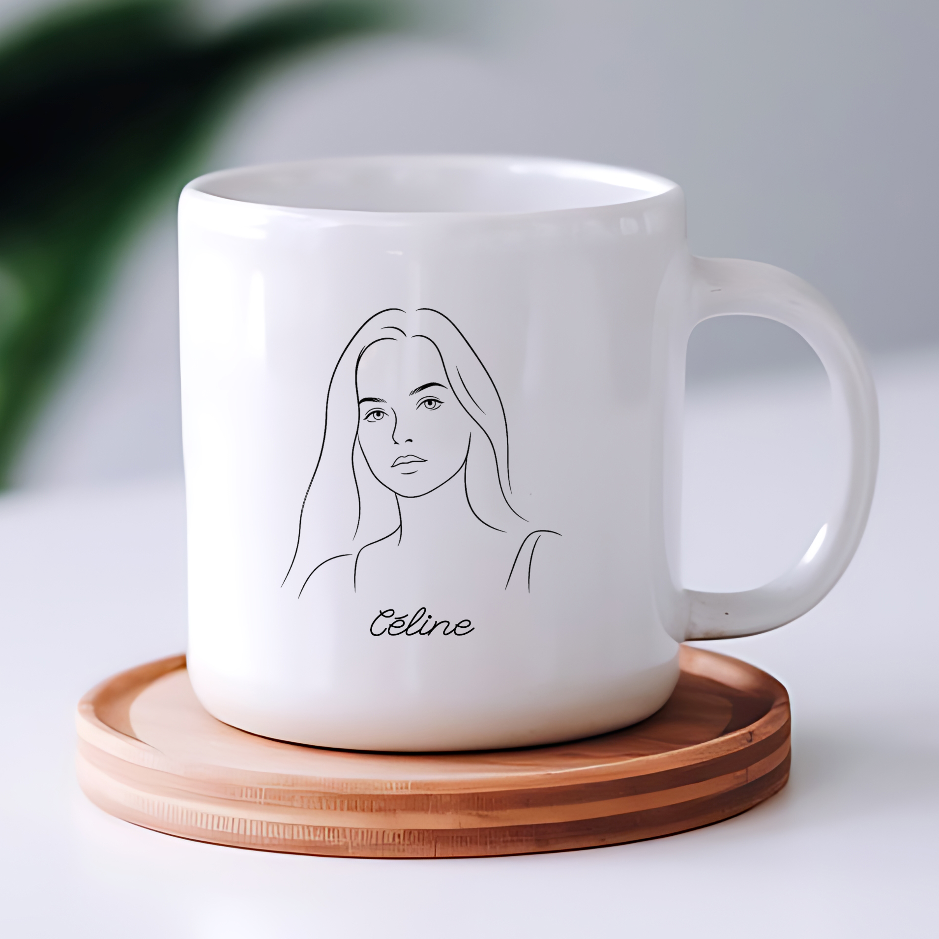 Portrait redessiné au trait d'encre noire, imprimé sur un mug en céramique blanche